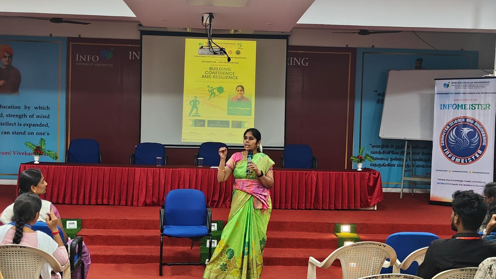 INFOMEISTER speaker addressing an audience