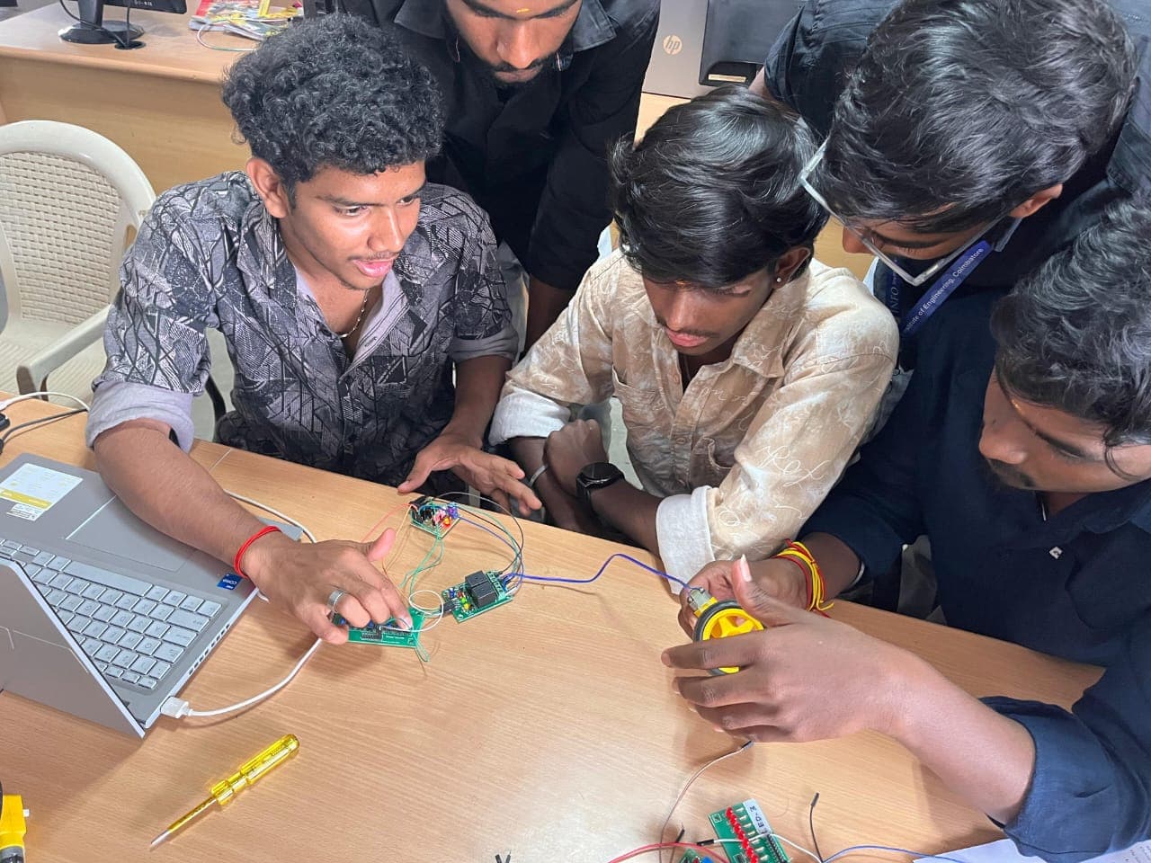 INFOMEISTER students collaborating on a project